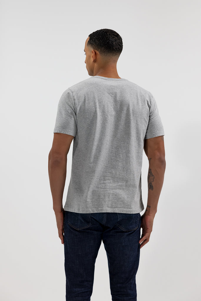 back view of model wearing Easy Mondays light grey heather colored V neck tee shirt
