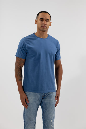 front of model wearing Easy Mondays ocean blue crew neck tee shirt